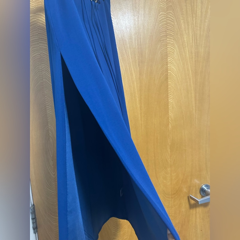 Meshki Royal Blue Maxi Dress with beautiful hardwood finish.